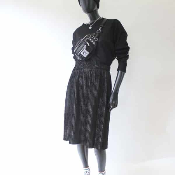 Plissee Skirt: Black Leo